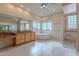 Luxurious bathroom featuring a soaking tub, glass shower, and dual sink vanity at 7211 E Rising Star Way, Carefree, AZ 85377