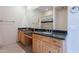 Bathroom featuring double vanities with granite countertops at 7211 E Rising Star Way, Carefree, AZ 85377