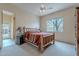 Cozy bedroom featuring a rustic wooden bed frame and a view to the outside at 7211 E Rising Star Way, Carefree, AZ 85377