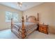 Bedroom with a wooden bed frame and matching nightstand at 7211 E Rising Star Way, Carefree, AZ 85377