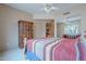 Bedroom showcasing wooden furniture and a mirrored closet door at 7211 E Rising Star Way, Carefree, AZ 85377