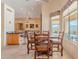 Open dining area with views, seamlessly connected to the kitchen, offers a welcoming space for dining and socializing at 7211 E Rising Star Way, Carefree, AZ 85377