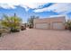 Expansive brick driveway leading to an attached two-car garage at 7211 E Rising Star Way, Carefree, AZ 85377