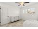 Bedroom featuring a ceiling fan, bright light, and neutral paint at 7531 E Belleview St, Scottsdale, AZ 85257