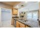 Granite counters highlight an open kitchen with modern appliances and a seamless flow to the living area at 7629 N Via De La Campana --, Scottsdale, AZ 85258