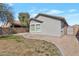 Low maintenance backyard with gravel, grass, privacy fence, and a desert-friendly perimeter at 9121 W Alvarado St, Phoenix, AZ 85037