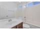 Bathroom features a single sink vanity and a shower/tub combination at 9121 W Alvarado St, Phoenix, AZ 85037