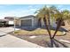 Charming single-story home with desert landscaping and a two-car garage at 9121 W Alvarado St, Phoenix, AZ 85037