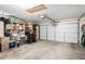 Spacious garage with built-in shelving, ideal for storage and organization at 9853 W Irma Ln, Peoria, AZ 85382