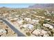 Overhead view of desert community highlighting well-maintained homes and landscaping at 9870 E Little Nugget Way, Gold Canyon, AZ 85118