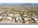 Picturesque aerial view highlighting elegant homes and lush landscaping within an upscale desert community at 9870 E Little Nugget Way, Gold Canyon, AZ 85118