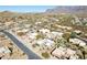 Wide neighborhood shot showing desert environment, mountain views, and community layout at 9870 E Little Nugget Way, Gold Canyon, AZ 85118