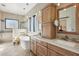 Bathroom featuring a walk in shower, soaking tub, dual sinks, and hanging pendant lighting at 9870 E Little Nugget Way, Gold Canyon, AZ 85118