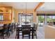 Charming dining room featuring wood-beamed ceilings and mountain views at 9870 E Little Nugget Way, Gold Canyon, AZ 85118