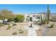 Desert home with xeriscaping, a fountain, and mountain views at 9870 E Little Nugget Way, Gold Canyon, AZ 85118