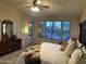 Relaxing main bedroom with a serene view of the outdoor greenery and comfortable furnishings at 10731 W Wikieup Ln, Peoria, AZ 85373