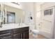 Cozy bathroom featuring shower/bath, granite countertop and large vanity at 11026 E Nopal Ave, Mesa, AZ 85209