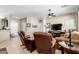 Inviting living room featuring tile floors, ceiling fan, and cozy seating at 11026 E Nopal Ave, Mesa, AZ 85209