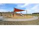 Community playground with shade and equipment for outdoor fun and recreation at 13224 W Crimson Ter, Peoria, AZ 85383