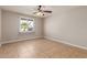 Bedroom featuring tile flooring, ceiling fan, and natural light at 13232 N 40Th Pl, Phoenix, AZ 85032