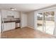 Eat-in kitchen with white cabinets and stainless steel appliances at 13232 N 40Th Pl, Phoenix, AZ 85032