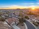 Scenic aerial view of a desert community featuring mountain views and tile roofs at 13583 S 177Th Ln, Goodyear, AZ 85338