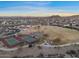 Community aerial view of parks and recreational areas, including tennis courts, and basketball courts at 13583 S 177Th Ln, Goodyear, AZ 85338