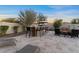 Lush outdoor backyard featuring a built in bbq and patio, perfect for entertaining at 13583 S 177Th Ln, Goodyear, AZ 85338