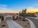 Beautiful single Gathering home featuring desert landscaping, two-car garage, and tile roof at 13583 S 177Th Ln, Goodyear, AZ 85338