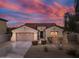 Charming single-story home with a well-maintained desert landscape and a two-car garage at 13583 S 177Th Ln, Goodyear, AZ 85338