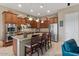 Modern kitchen featuring granite countertops, stainless steel appliances, and ample cabinet space at 13583 S 177Th Ln, Goodyear, AZ 85338