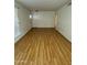 Living room features hardwood-look flooring and entryway at 13846 N Tan Tara Dr, Sun City, AZ 85351