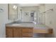 Bright bathroom with updated countertop, cabinets, and mirror at 13914 W Terra Vista Dr, Sun City West, AZ 85375