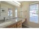 Bathroom featuring granite countertop and natural light at 13914 W Terra Vista Dr, Sun City West, AZ 85375