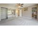 Bright bedroom features large closet and neutral walls at 13914 W Terra Vista Dr, Sun City West, AZ 85375