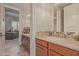 Well-lit bathroom with double vanities and mosaic stone accents at 1440 N 40Th St # 4, Mesa, AZ 85205