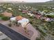 Aerial view of a desert home with a pool, patio, and driveway at 15101 E Aspen Dr, Fountain Hills, AZ 85268