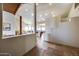 Bright open-concept foyer with staircase, stone floors and a view of the living spaces at 15101 E Aspen Dr, Fountain Hills, AZ 85268