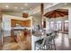 Spacious kitchen featuring custom wood cabinetry, granite countertops, and a large island with seating at 15101 E Aspen Dr, Fountain Hills, AZ 85268