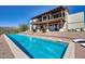 A luxurious backyard pool and patio with a mountain view at 15101 E Aspen Dr, Fountain Hills, AZ 85268