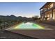 Swimming pool with mountain views in a well-maintained backyard at 15101 E Aspen Dr, Fountain Hills, AZ 85268