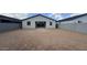 A spacious backyard with grey block fencing, ready for landscaping or a pool at 15761 W Beryl Ave, Waddell, AZ 85355