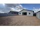 Spacious backyard with block fence and direct access to the home's sliding glass door at 15761 W Beryl Ave, Waddell, AZ 85355
