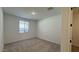 Bright bedroom with carpet floor and window providing lots of natural light at 15761 W Beryl Ave, Waddell, AZ 85355