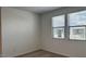 Bright bedroom with carpet floor and window providing lots of natural light at 15761 W Beryl Ave, Waddell, AZ 85355