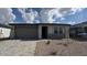 Charming single-story home with a two-car garage, low maintenance desert landscaping, and paver driveway at 15761 W Beryl Ave, Waddell, AZ 85355