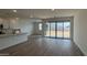 Living room with sliding doors providing access to the backyard at 15761 W Beryl Ave, Waddell, AZ 85355