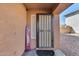 Covered front porch with security door at 162 N 225Th Dr, Buckeye, AZ 85326