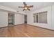 Open living room featuring hardwood floors and natural light at 18034 N Highwood Ct, Sun City, AZ 85373