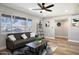 Bright living room featuring a large window, modern furniture, and stylish decor at 1913 E 1St Ave, Mesa, AZ 85204